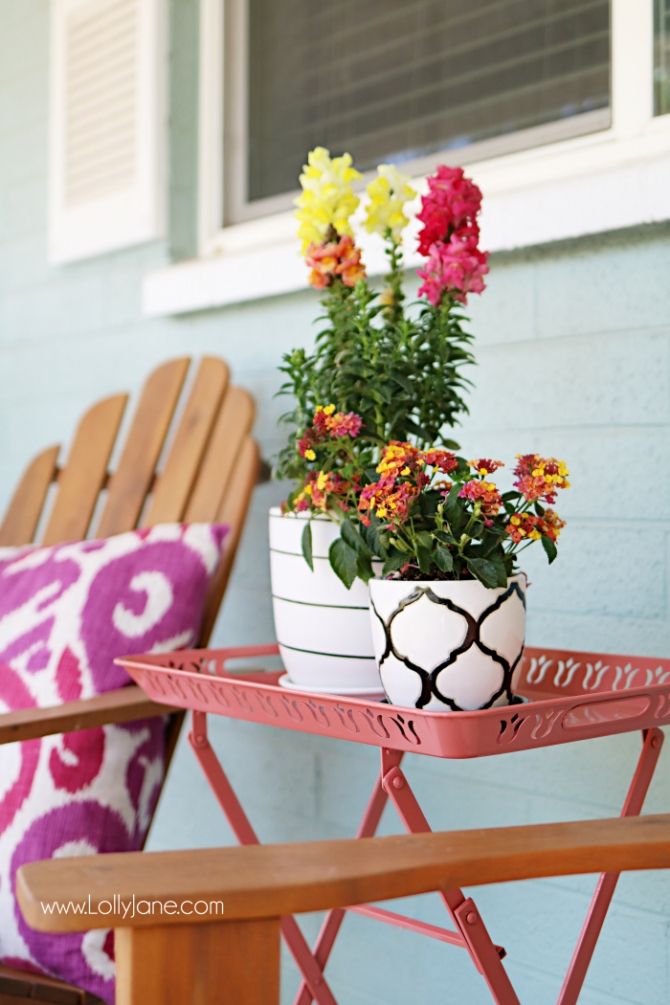 Fresh porch decor ideas! Love the pops of coral and bright summer colors! New va...