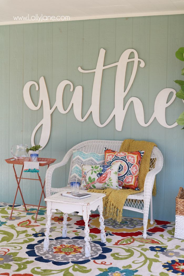 Love these affordable patio porch decor ideas! Add a neutral bench then fill it ...