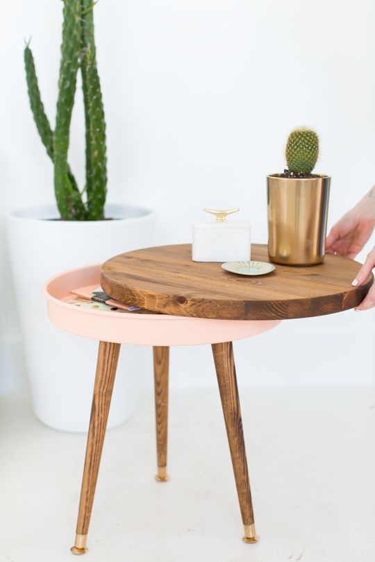 This DIY mid century end table can be used not only to display your favorite pla...