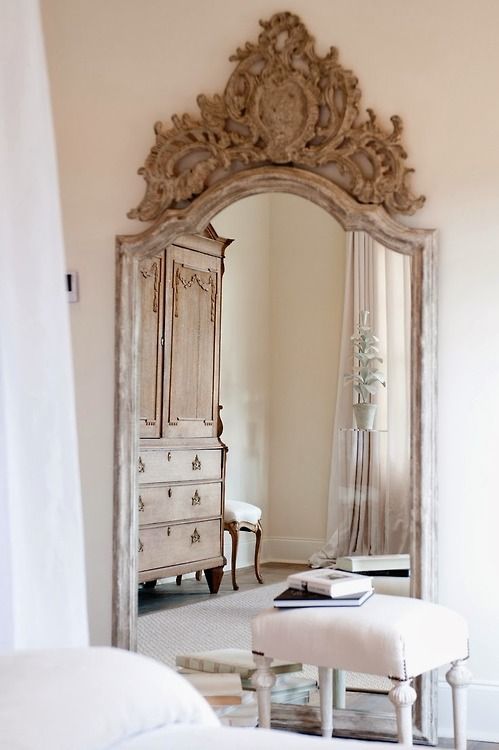 Love the ornate carvings! / French style bedroom