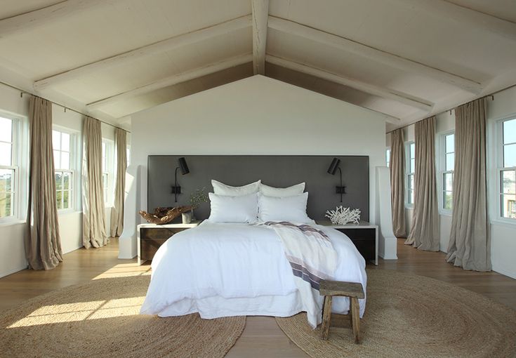 A white beach house - desire to inspire - white bedroom with vaulted ceiling, wo...