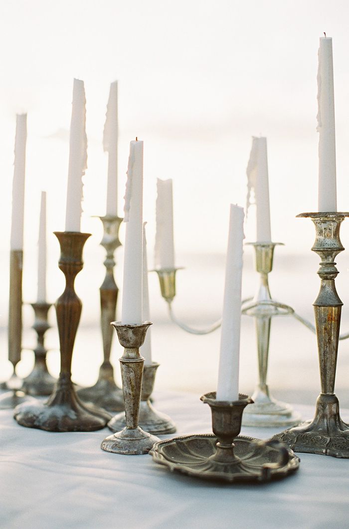 Warm Coastal Wedding Inspiration. Brass candlesticks.
