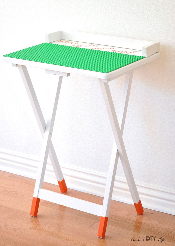 Portable DIY Lego table. An old TV table makeover never looked so cute!