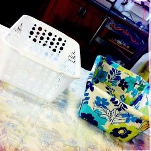 Dollar Store Bins covered with fabric using hot glue (no sewing needed). Love…
