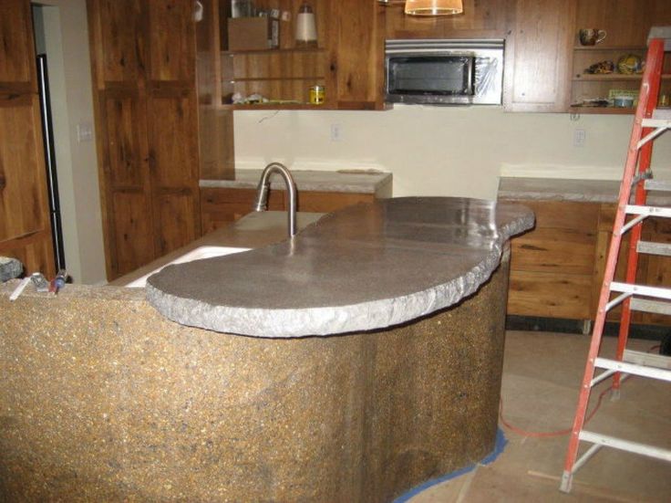 Ready to redo your kitchen? Concrete countertops are a great budget-friendly opt...