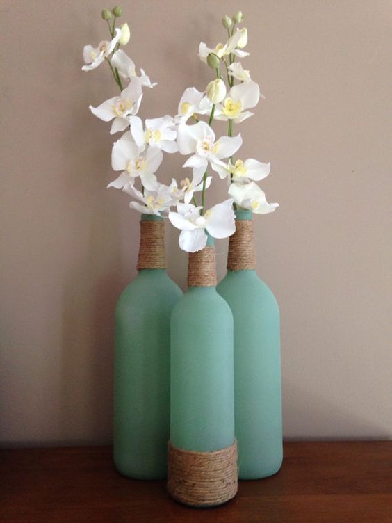 2 large & 1 regular size sea glass wine bottles wrapped with twine & filled with...