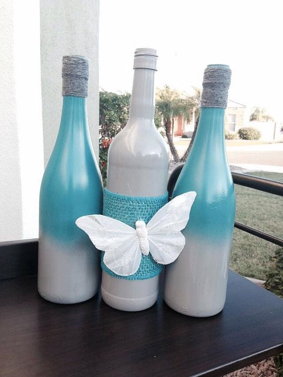 Set of upcycled wine bottles for your home decor or as a gift!    Spray painted ...