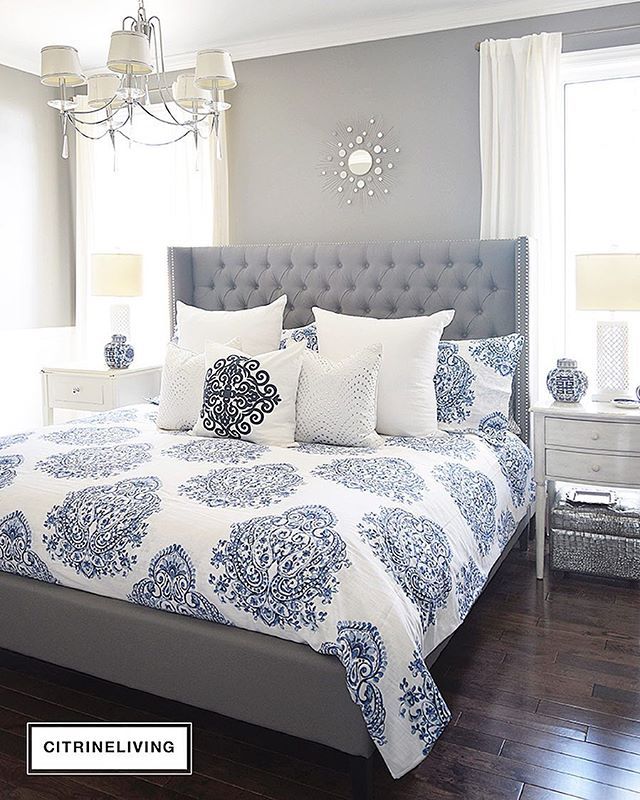 I'm in love with our new blue and white bedding and how much it brightens our be...