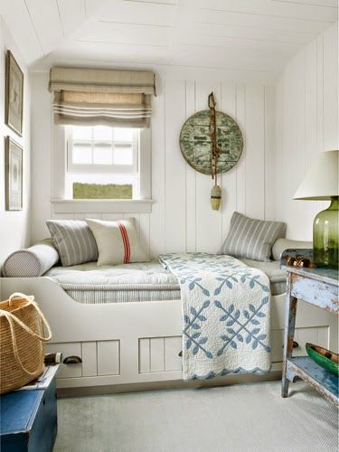 small bedroom idea with built in bed, roman shade, blue and white
