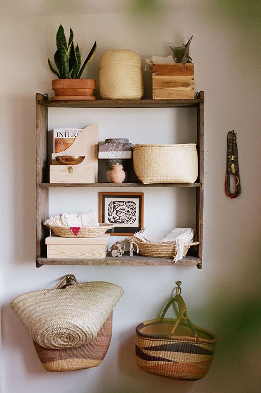 Don't have a foyer? Try placing a shelf with hooks in your entryway instead