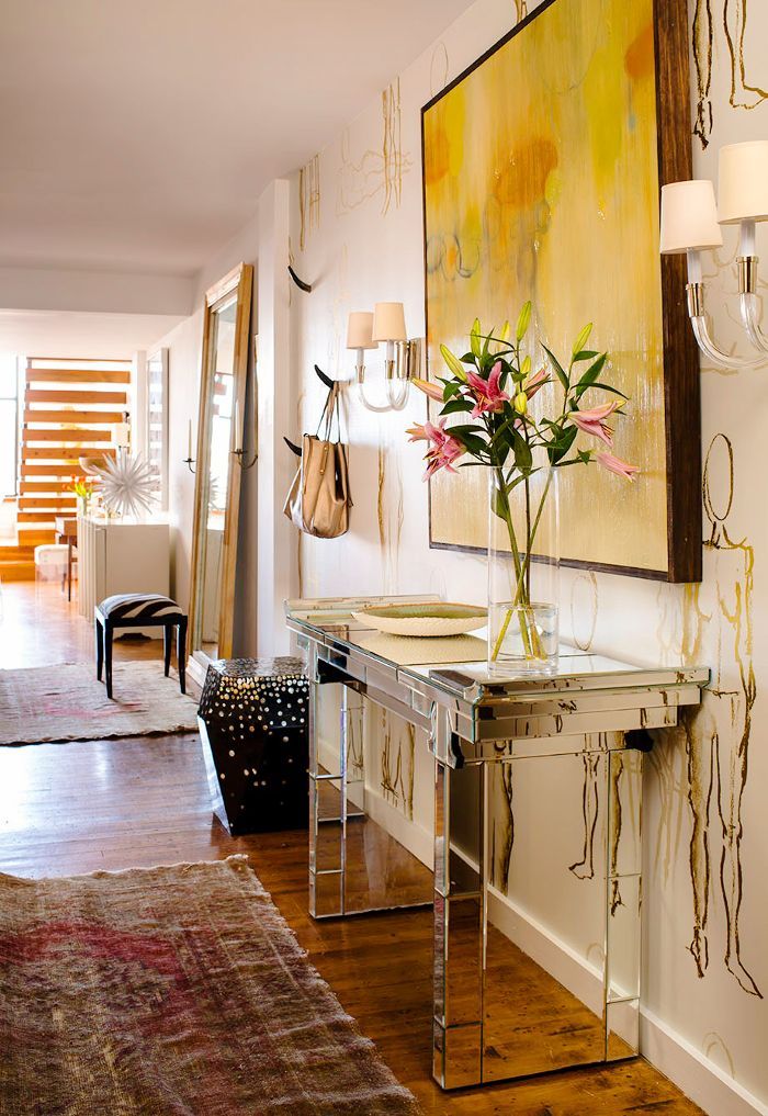 Eclectic glam entryway with mirror table