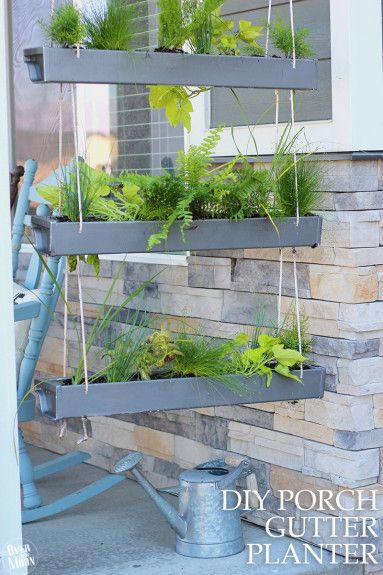DIY Hanging Gutter Planter - such a fun, easy and inexpensive project that even ...