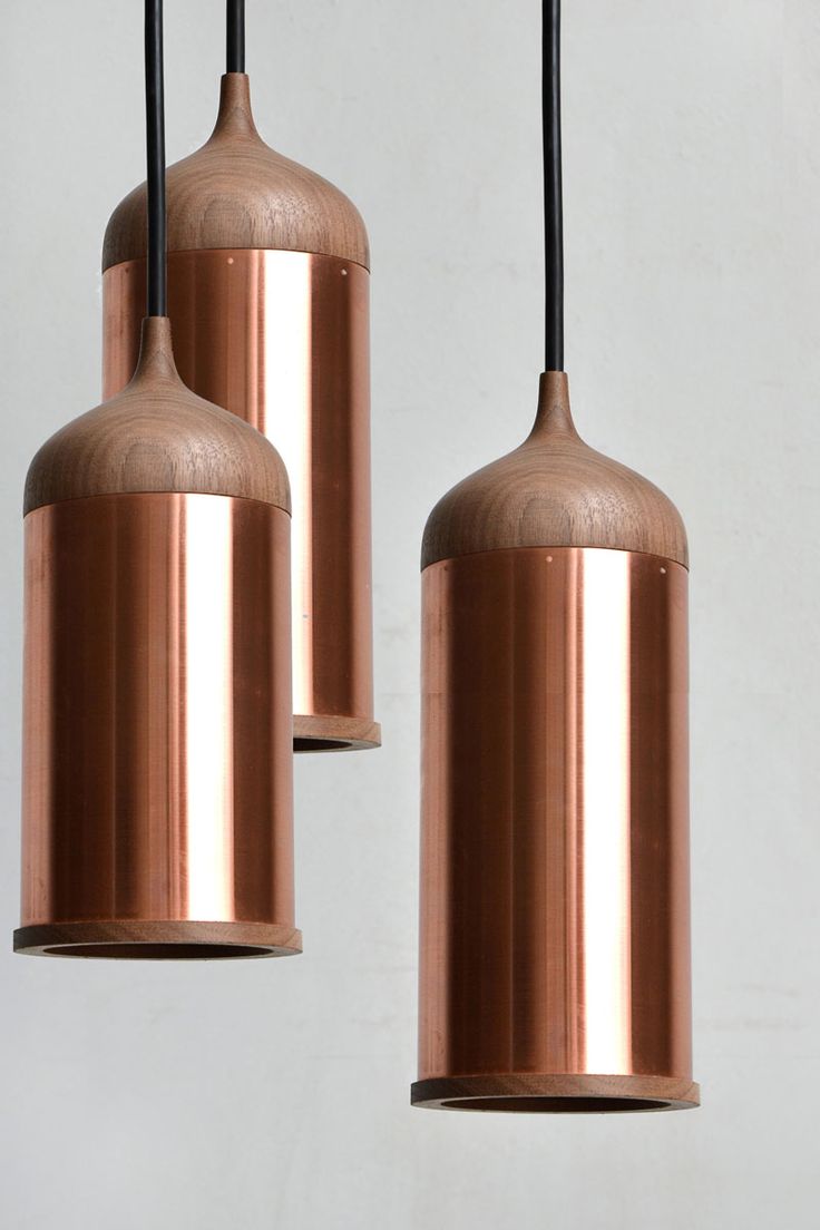 Hang copper pendant lights above your kitchen island to provide additional light...