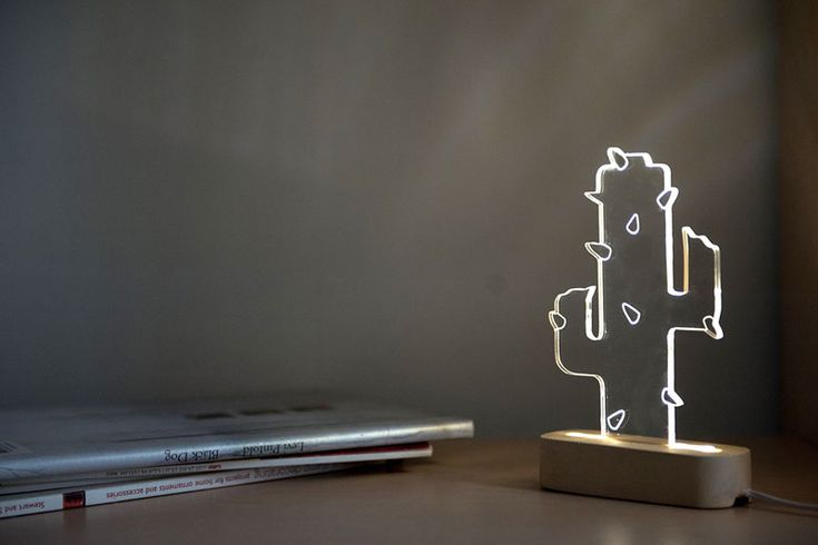 This modern small concrete and acrylic cactus lamp is a low maintenance alternat...