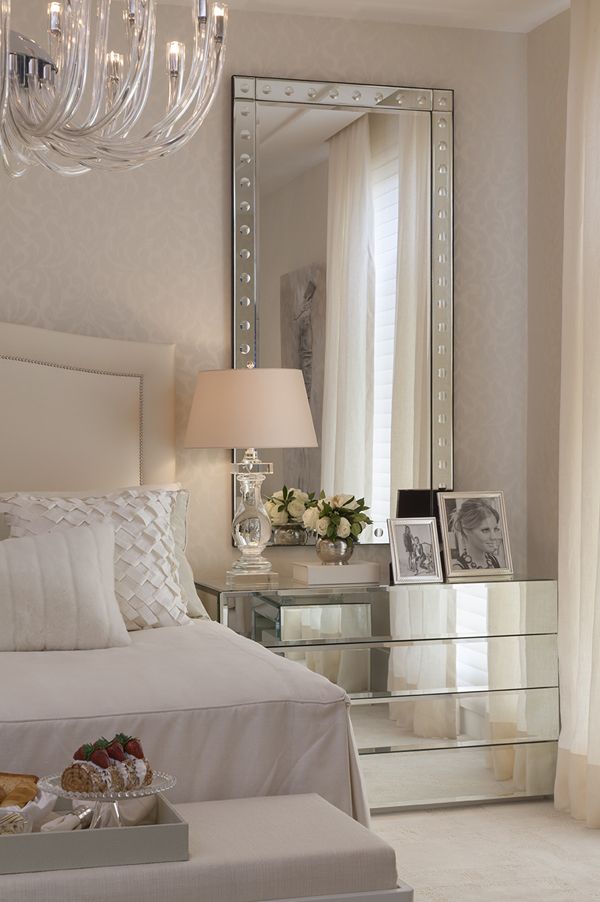 Love the mirror behind the bedside table