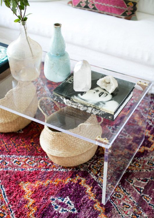 clearing up your coffee table clutter - colorful rug paired with glass coffee ta...