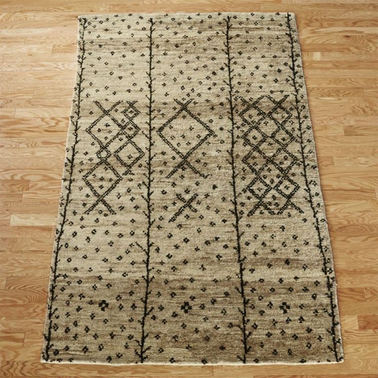 master footwork. Rich in texture and design, plush pile rug is a bit of a chamel...