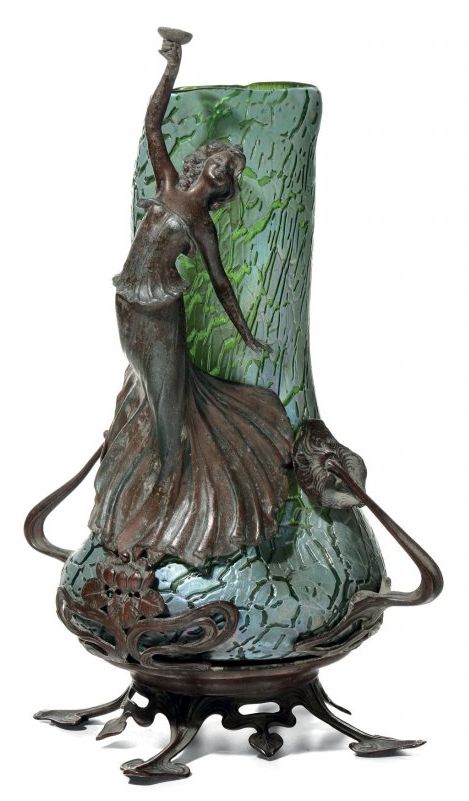 Loetz art glass vase in an Art Nouveau metal frame with a figural woman toasting...