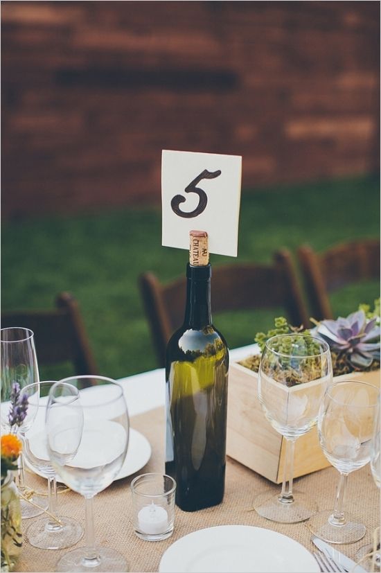 Take your empty wine bottles and turn them into gorgeous, unique table cards