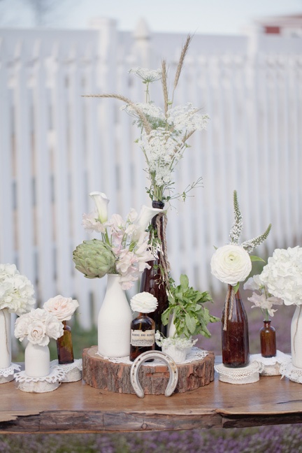 We love our new round wood centerpiece displays just finishes off that rustic lo...