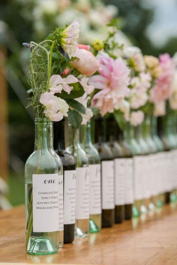 Wine corks are the usual go-to for vineyard wedding seating charts, but we think...