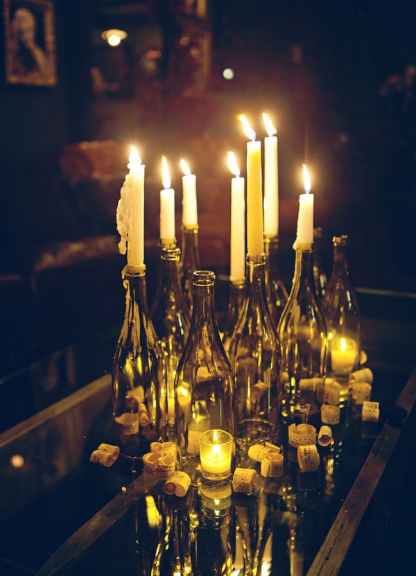 wine bottles with candles, great centerpiece for a speakeasy