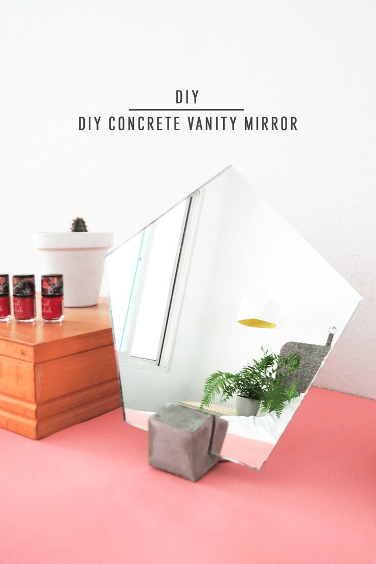 DIY Concrete Vanity Mirror by Ashley Rose of Sugar & Cloth, a top lifestyle blog...