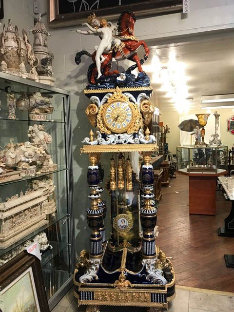Spectacular large porcelain clock with 24k gold gilding with blue enamel. Rich c...
