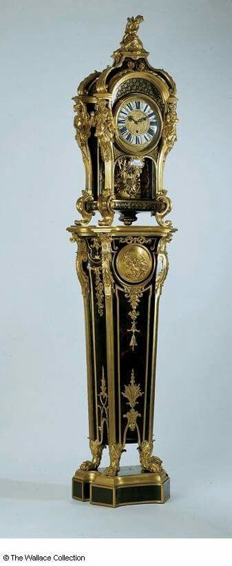 The pedestal and case of this clock are by Andre Charles Boulle, with sculptural...