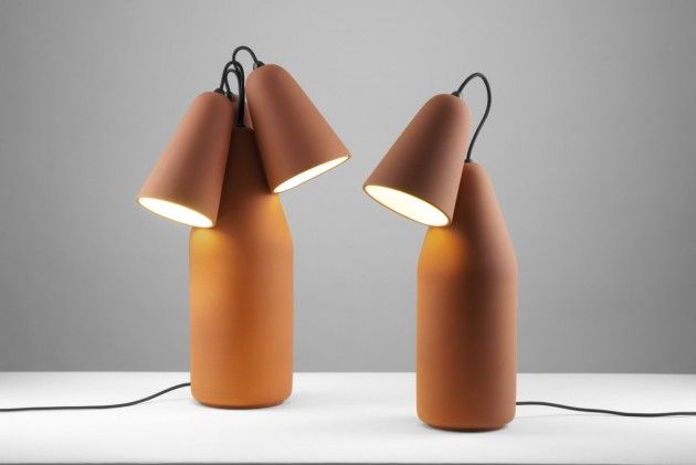 These quirky terracotta table lamps add a natural touch of decor to your home //...