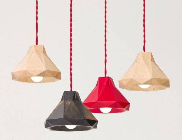 These small pendant lamps are made from wood // The Marionette Pendant Lamp by O...