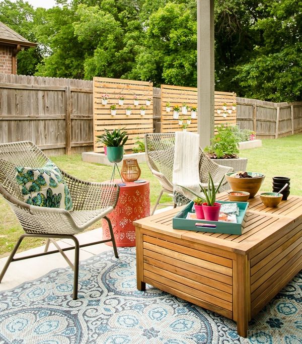 This back porch was dreary and unused before, but some smart swaps with paint, f...