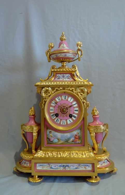 French antique mantel clock in ormolu and pink porcelain. ca.1870.