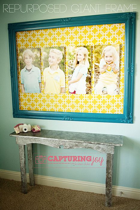 Giant Frame - Pictures mounted on foam board, fabric for the background all in a...