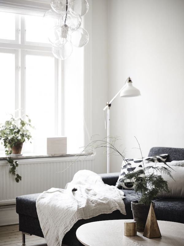 Calm white and grey in a Swedish apartment. Stadshem.