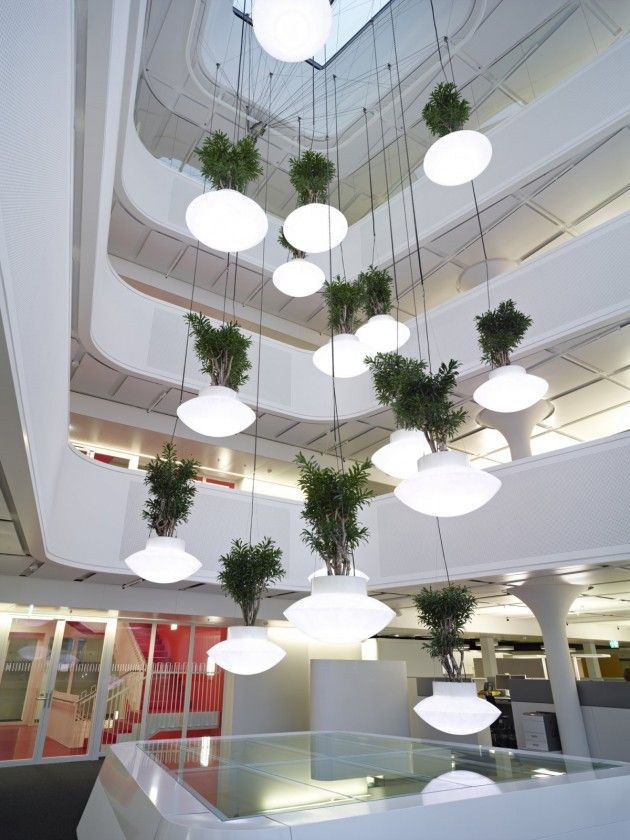 This hanging plant and light installation is a central feature of the Credit Sui...