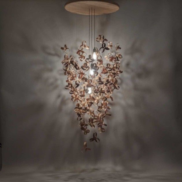 Tom Raffield has designed the Giant Flock Chandelier, made from over 120 steam-b...