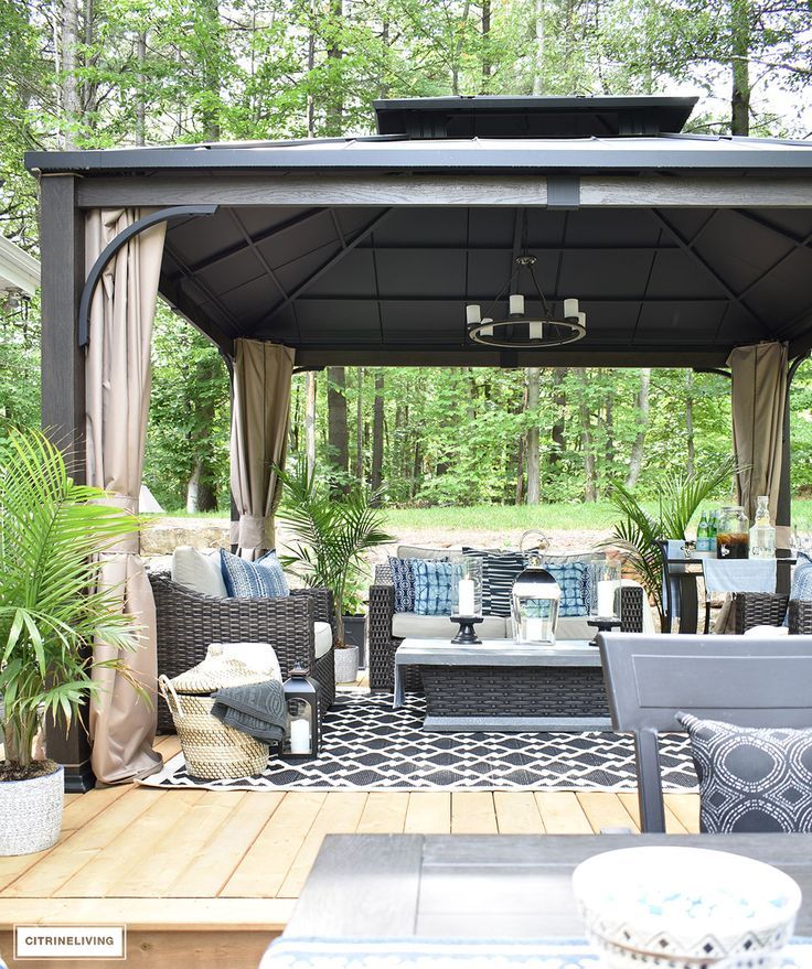 Create the perfect lounging area in your backyard with a beautiful covered gazeb...