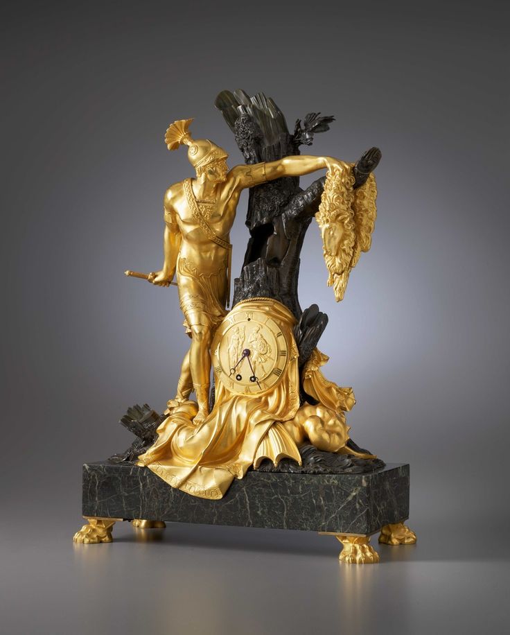 An Empire mantel clock with case representing Jason and the Golden Fleece attrib...