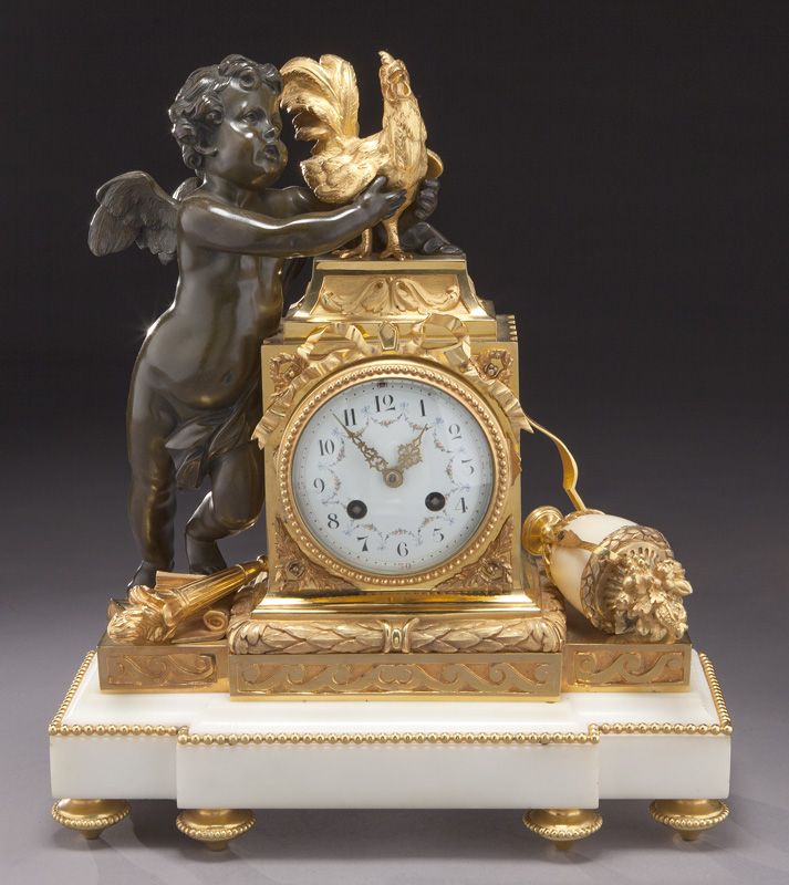Gilt and patinated bronze mantel clock,