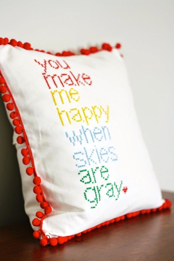 Use a saying to make this pretty DIY cross stitch pillow cover - and then add a ...