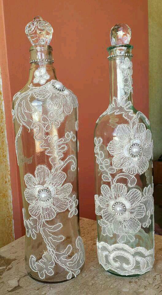 Bottles with pearls and floral doilies