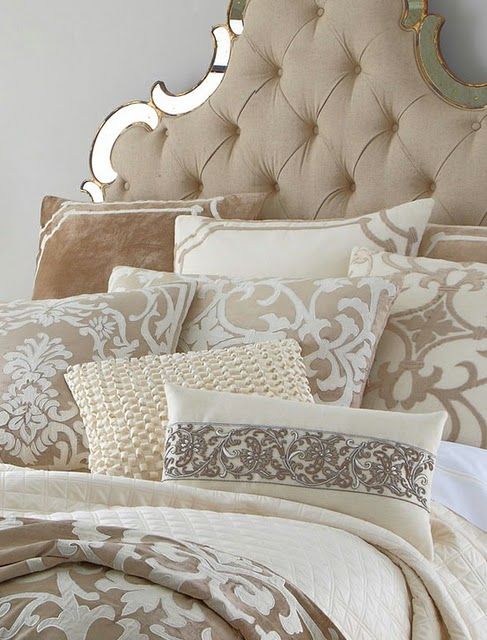Mixing neutrals and patterns - love the pillows...