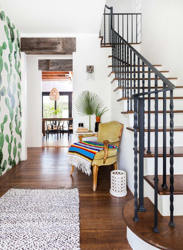 pops of color in a neutral global style entryway