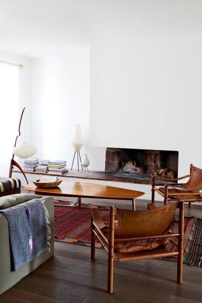 leather chairs and kilim rug