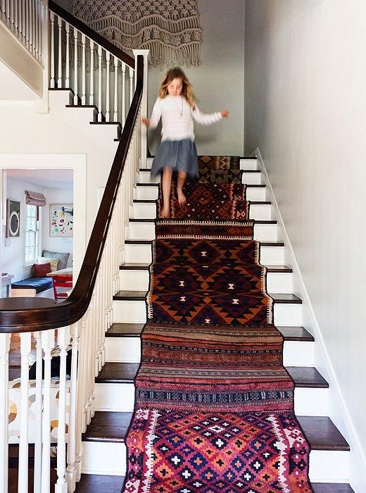 The kilim-covered stairs are the first thing you see when you step inside.