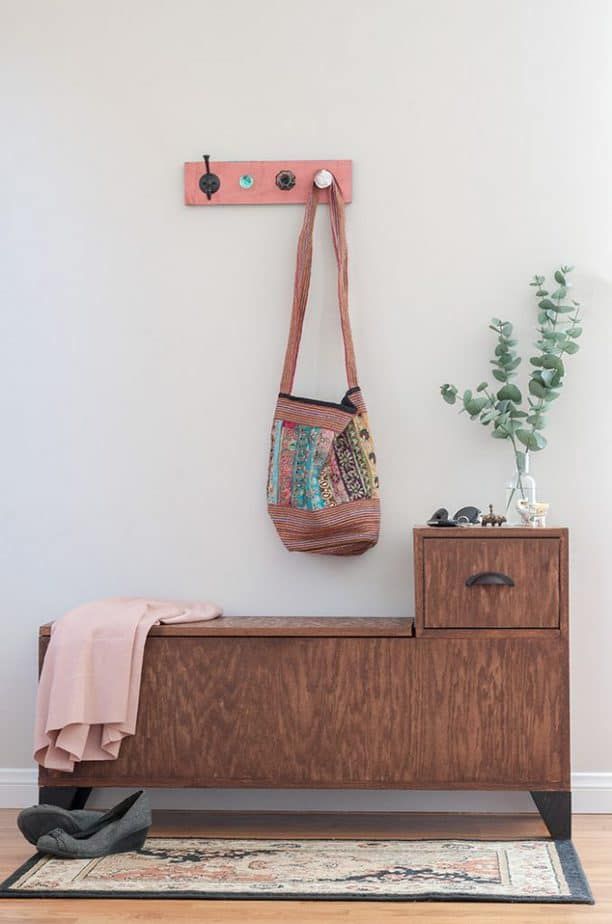Need this in my entrance! Easy DIY entryway Storage bench. Perfect for small spa...