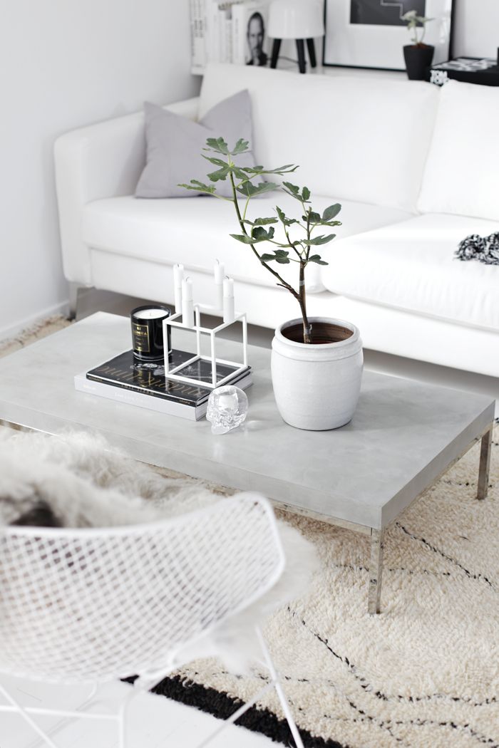 black and white Scandinavian living room. DIY concrete table