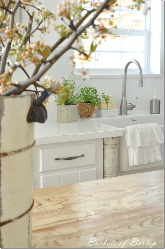 Painted White Countertops for kitchen.  Look fab, wish I could do it.