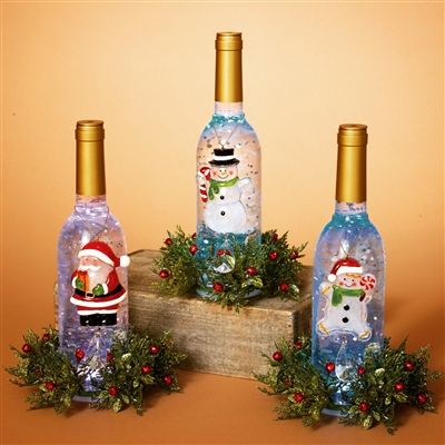 Gerson 11''h b/o lighted acrylic wine bottle w/snowman & floral accent (set of 3)